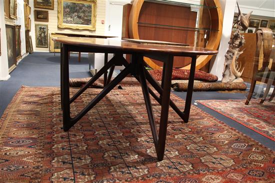 Kurt Ostervig for Jason Mobler, Denmark, 1960s. A rosewood drop-leaf dining table extends to 6ft 4.5in.